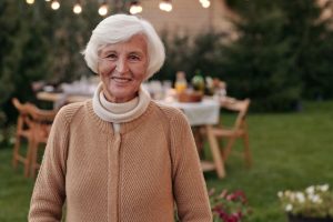 2025 estate tax exclusion, image of white haired woman