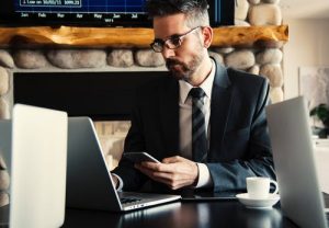estate planning for cryptocurrency, image of businessman working on a laptop