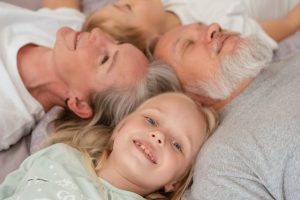 legacy planning, image of family lying down looking upward