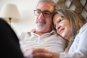 protect your estate, image of older couple snuggling on a couch
