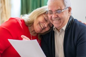 How Long Will My Heirs Have to Wait for Their Inheritances, image of senior couple looking at a document